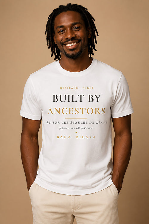 Bana Bilaka Built by Ancestors — premium white organic cotton men's tee worn by a Black man, editorial portrait
