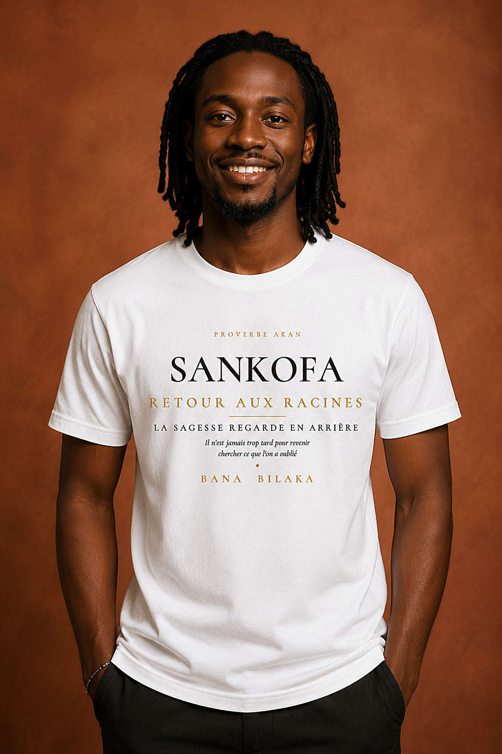 Bana Bilaka Sankofa — premium white organic cotton men's tee worn by a Black man with dreadlocks, editorial portrait