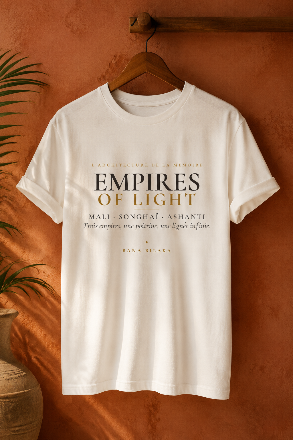 Bana Bilaka Empires of Light — t-shirt blanc sur cintre, ambiance boutique terracotta