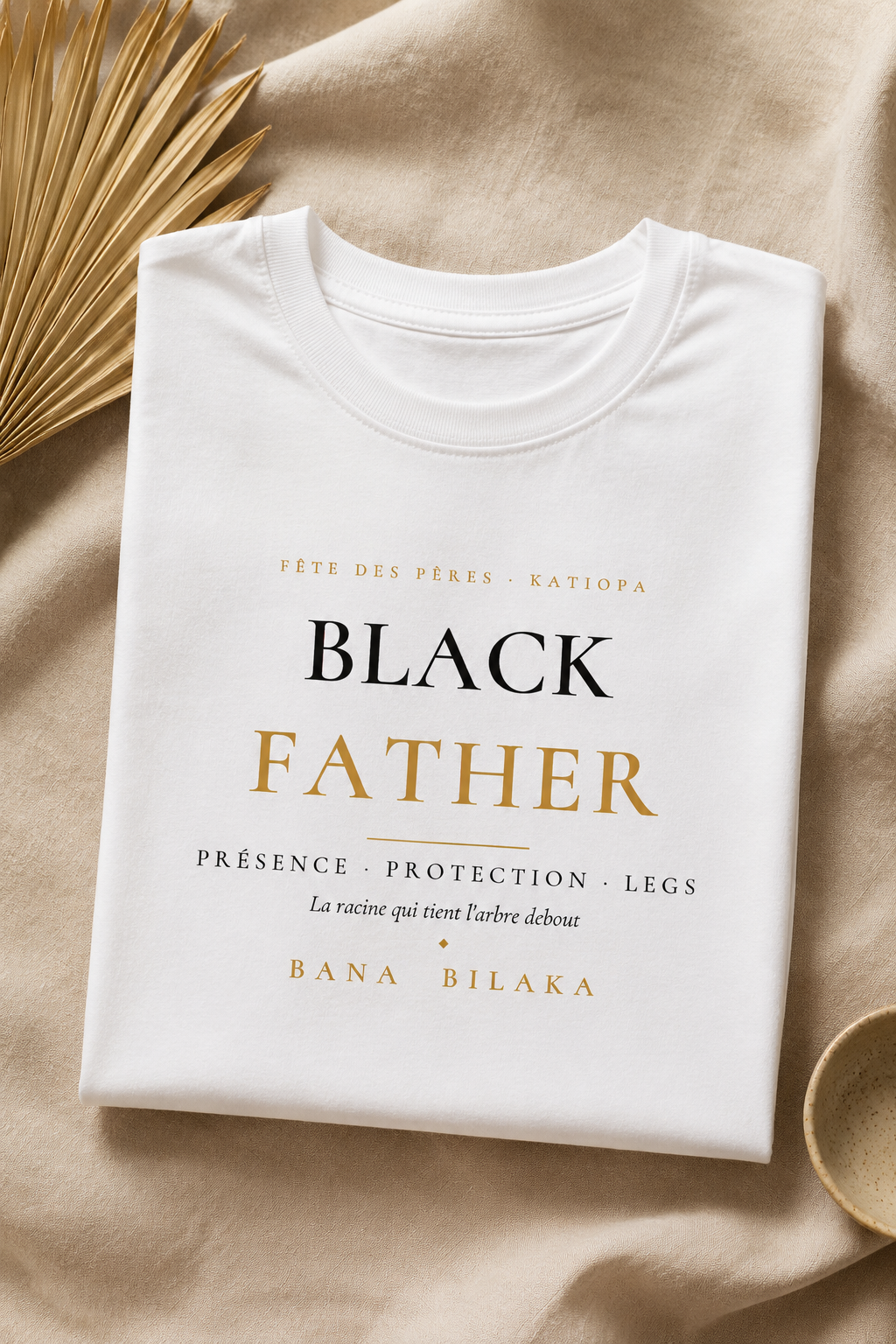 Bana Bilaka Black Father — t-shirt blanc coton bio, mise en scène flat-lay premium