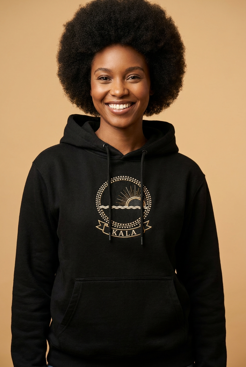 Kala jet black hoodie worn by a model, embroidery-style Kongo emblem printed as a chest crest, Dikenga Collection by Bana Bilaka